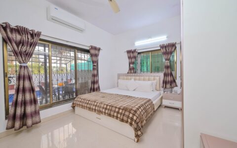 Hideaway 4 Bhk Villa - Ground floor bedroom with Pool View